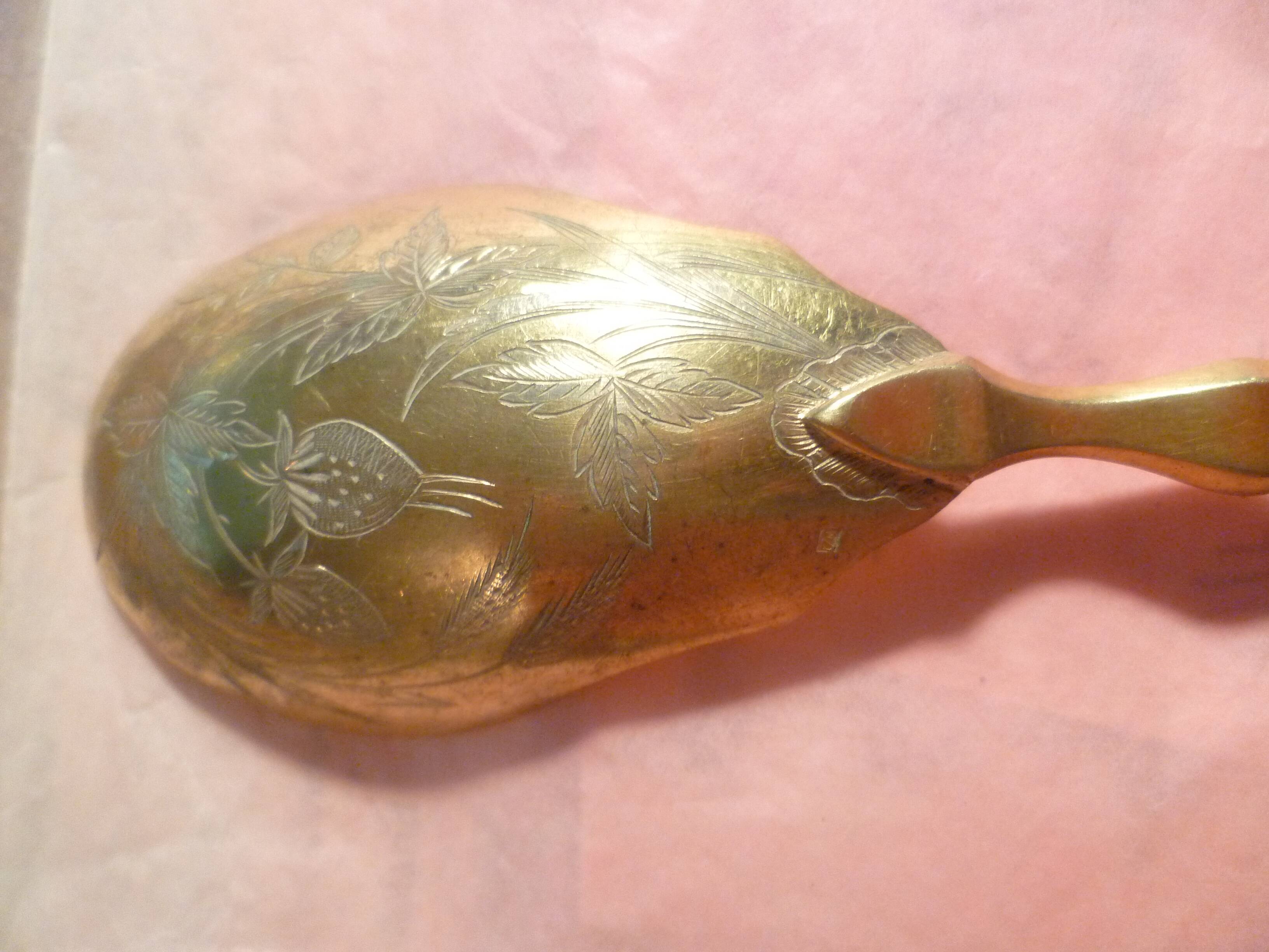 SILVER DESSERT SPOON, hallmarked ? chiseling on the spoon