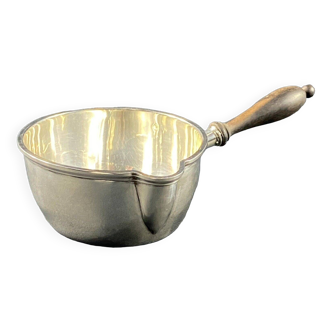 Casserole with silver metal pouring spout