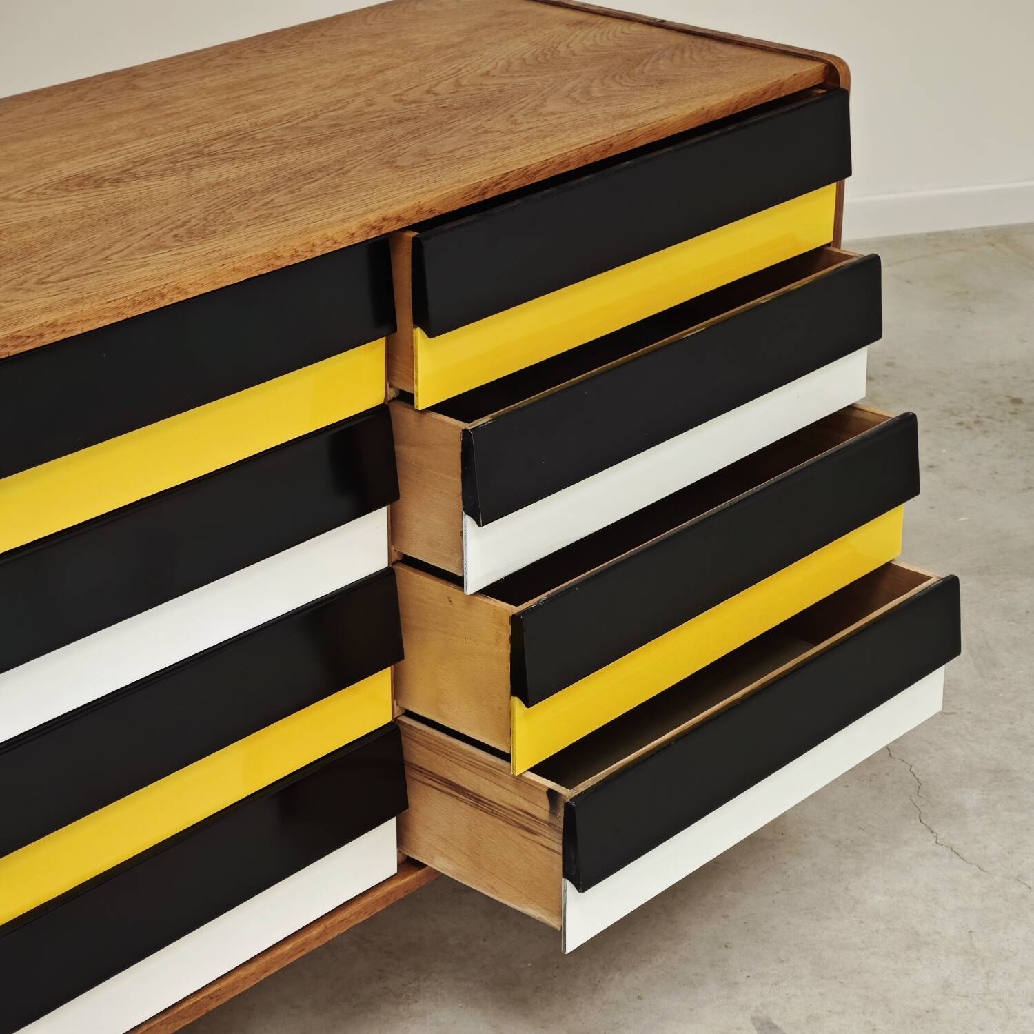 U453 yellow 8-drawer wooden sideboard by Jiri Jiroutek for Interier Praha 1960