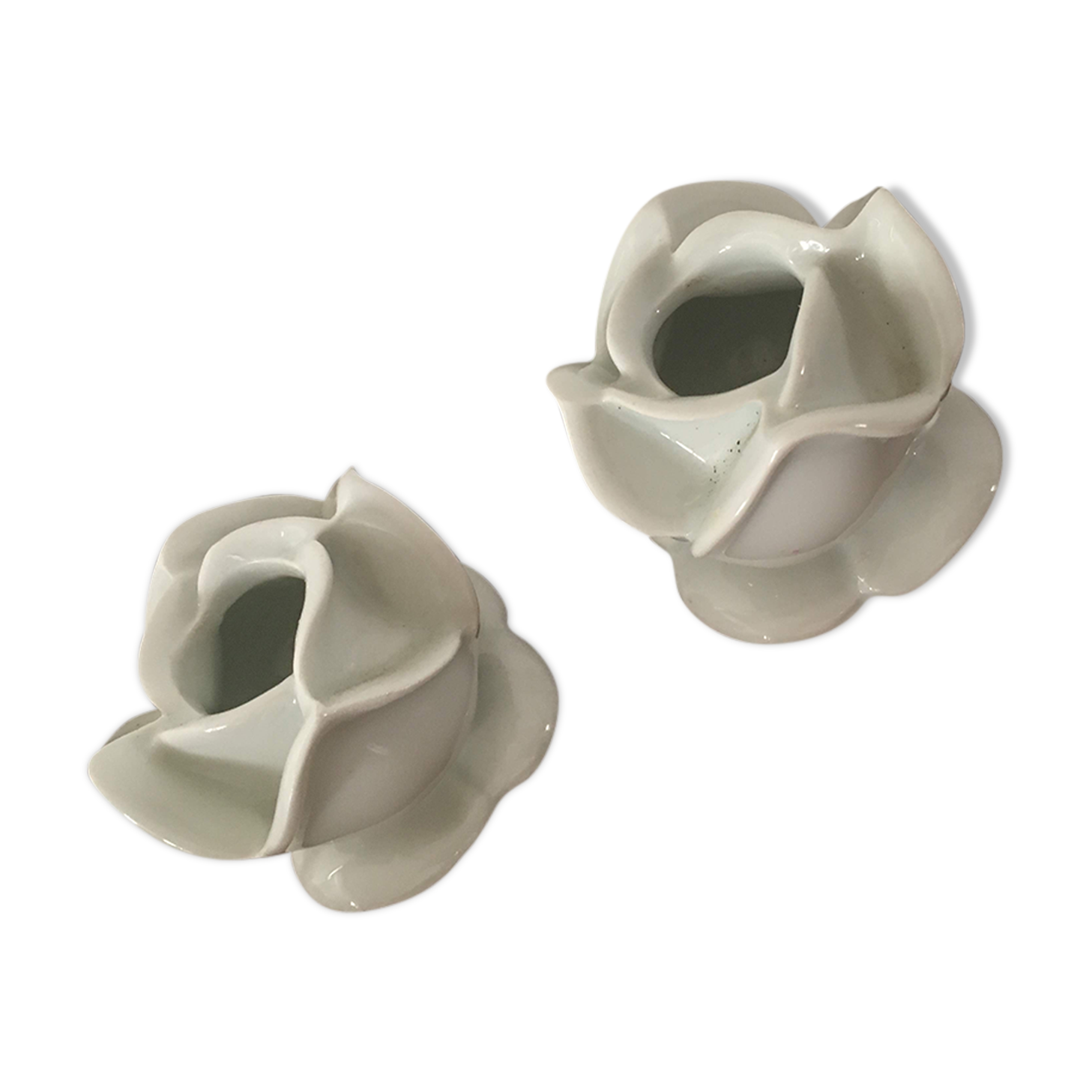 Two white porcelain flower candlesticks