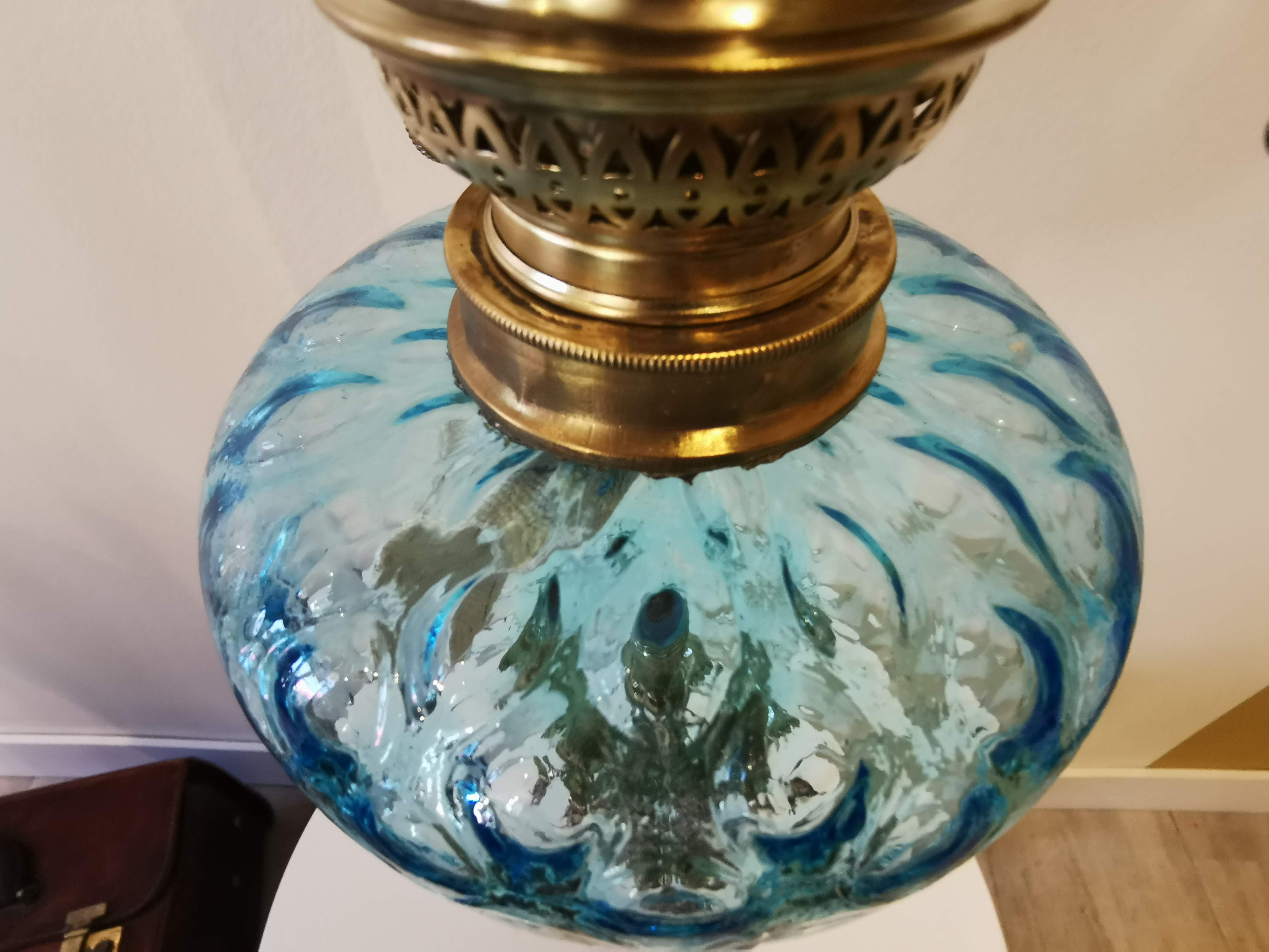 Large kerosene lamp mounted on bronze statue. Late nineteenth century