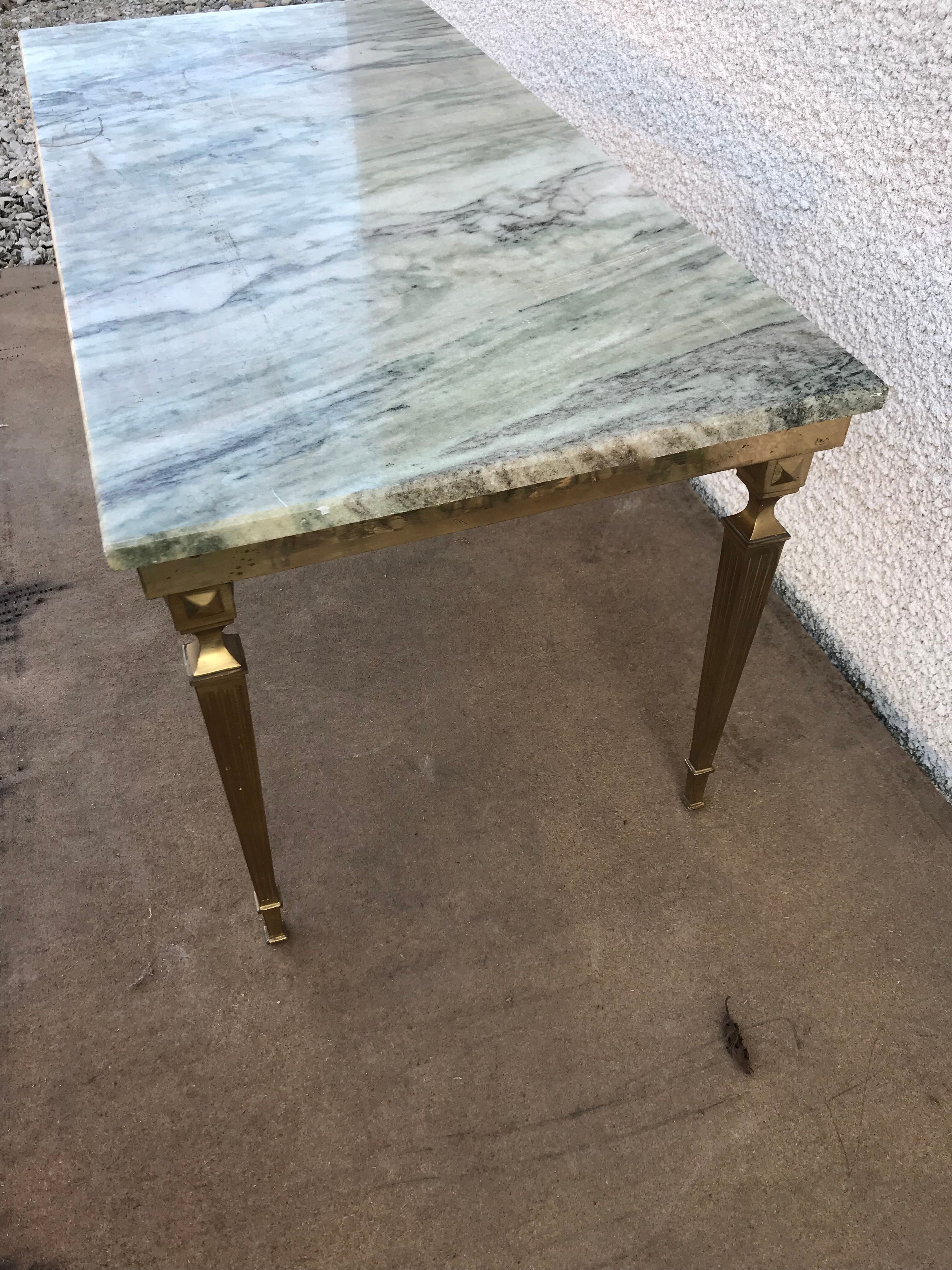 Table low marble and golden bronze