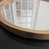 Oval mirror in gilded wood 43x53cm
