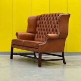 English Georgian Style Tufted Leather Chesterfield Wingback Two Seater Sofa