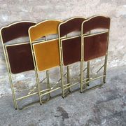 4 folding chairs in Velvet, cinema, gold metal, made in Belgium