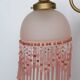 Applique verre rose à guirlande de perles
