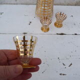 Set of gilded glass liqueur set streaked carafe and 3 glasses