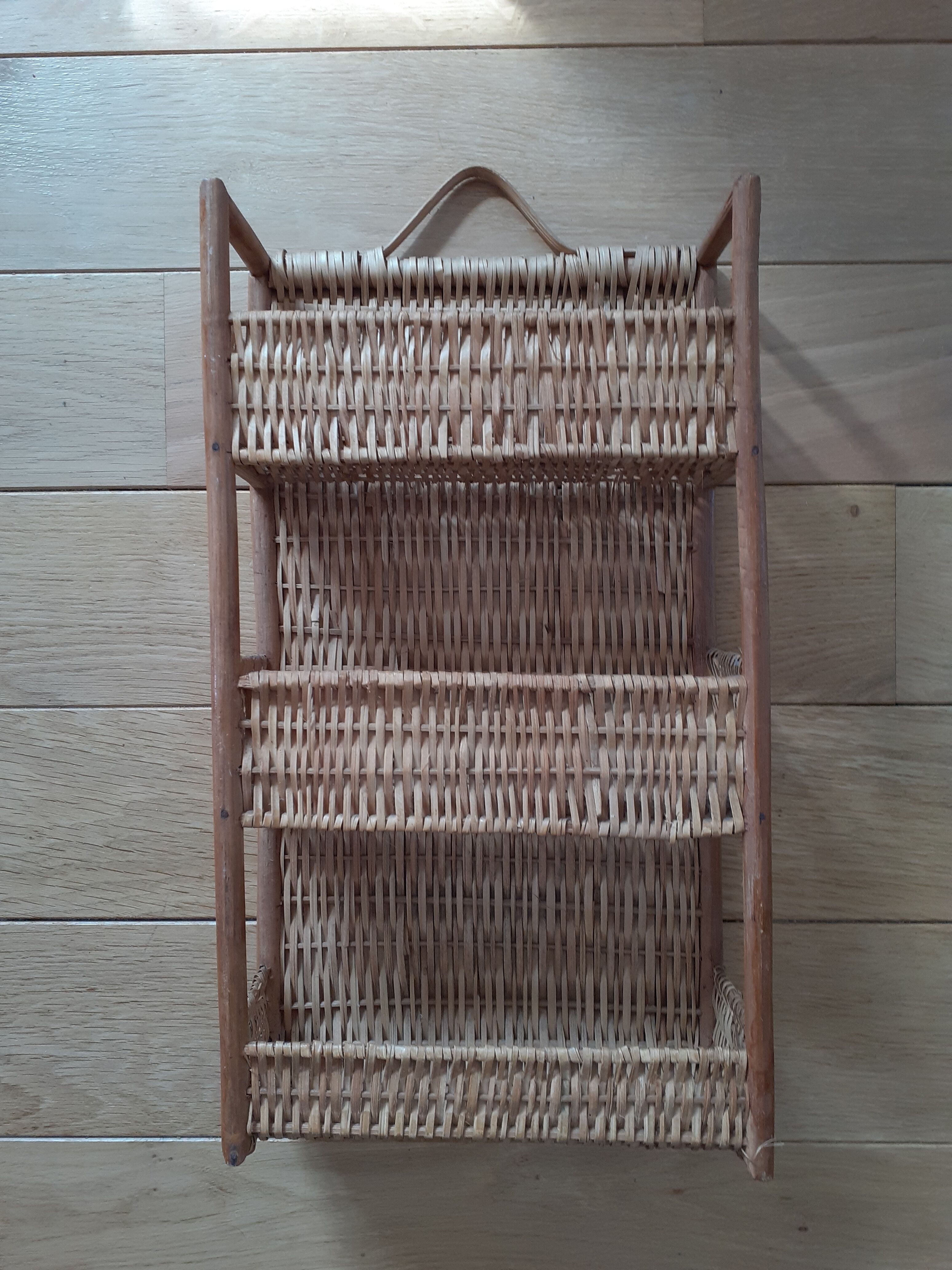 Rattan and wicker wall shelf