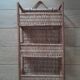 Rattan and wicker wall shelf