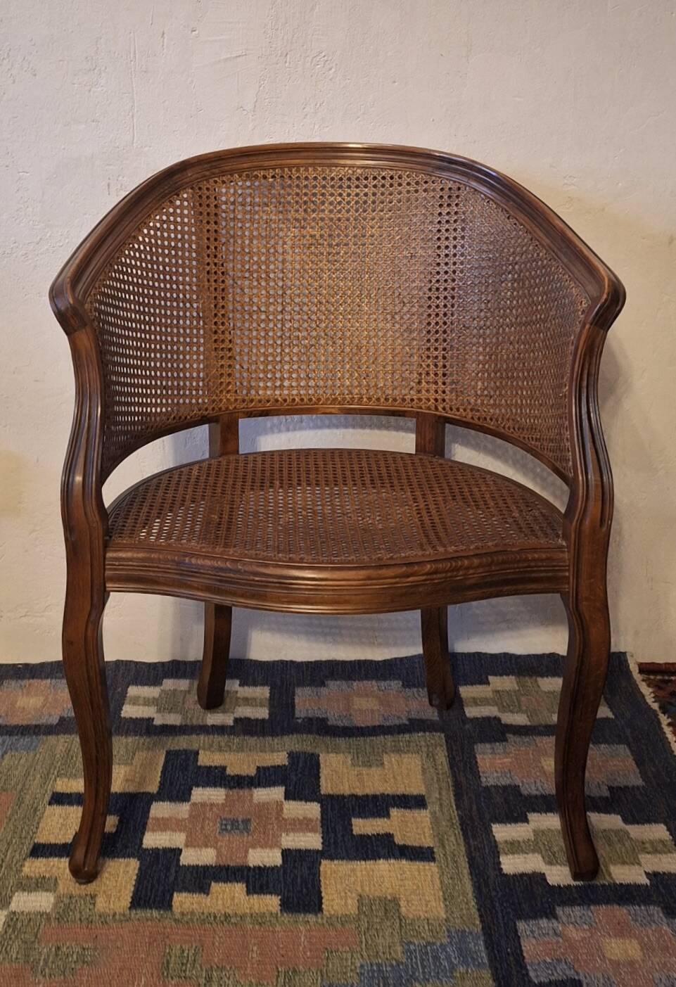 Half-moon rattan and hardwood armchair, early 20th century