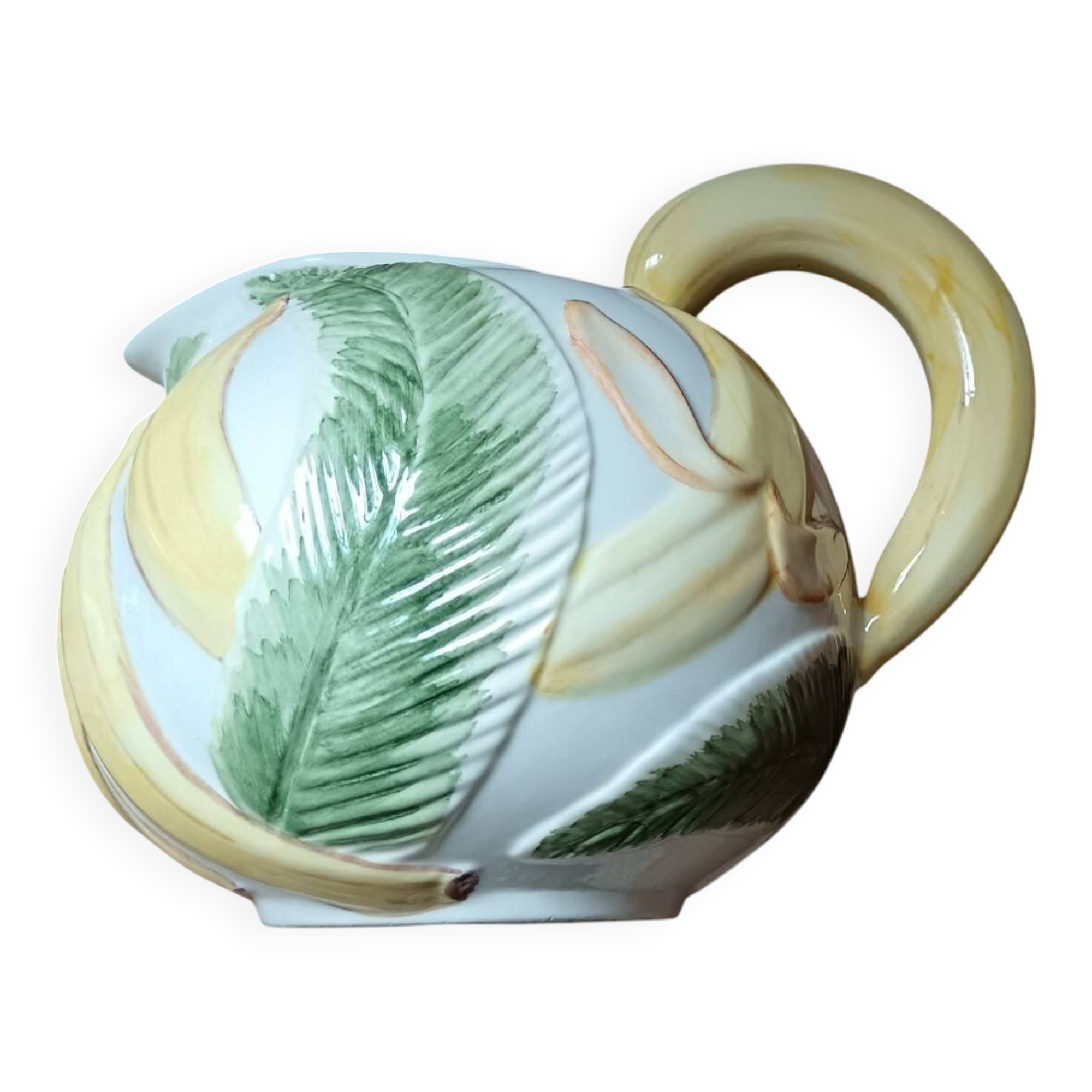 Jug in earthenware with banana decoration.