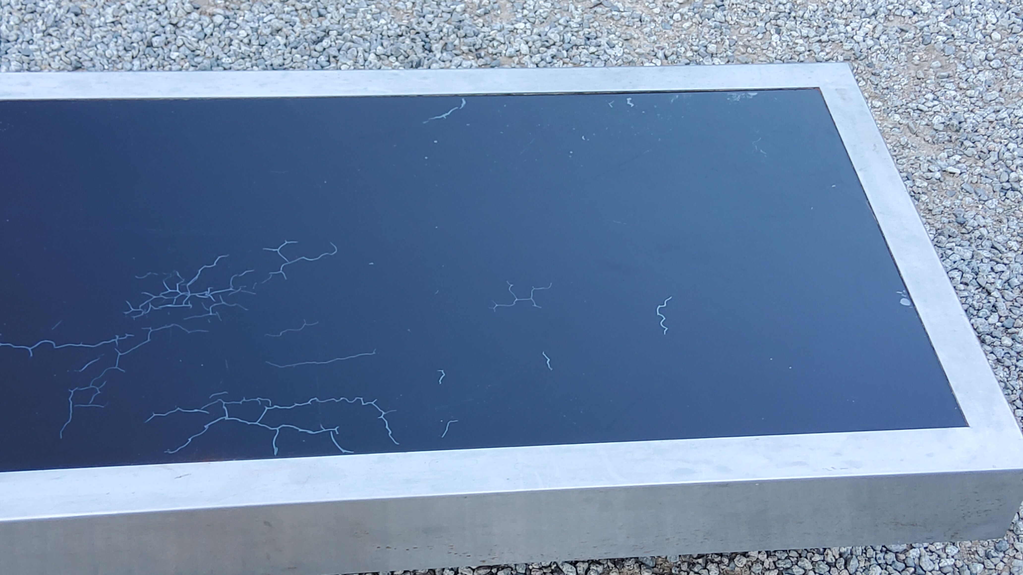 Coffee table in brushed steel and black tinted glass from the 70s
