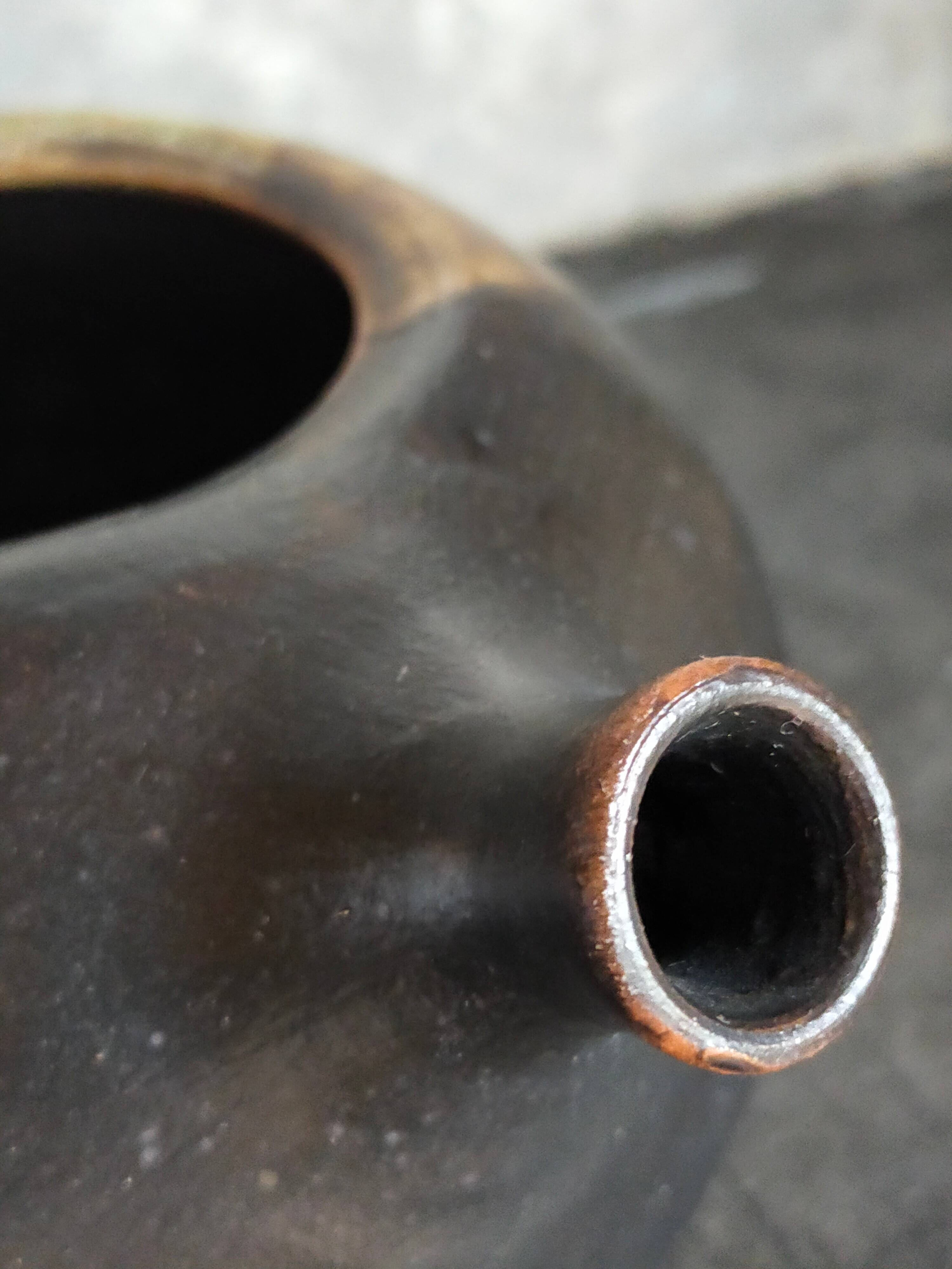 Vintage enameled stoneware potter's teapot