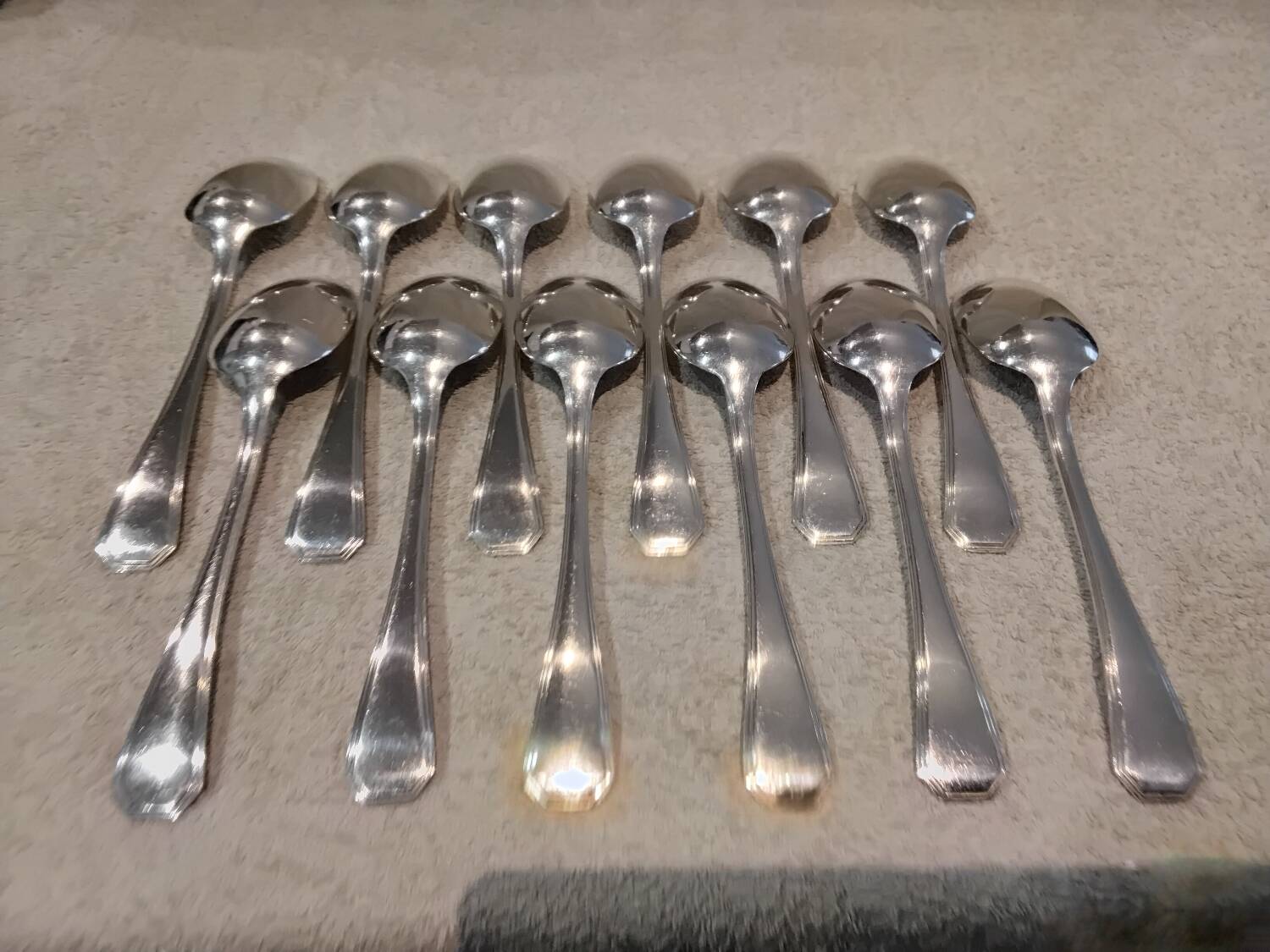 12 silver-plated soup spoons by Christofle America