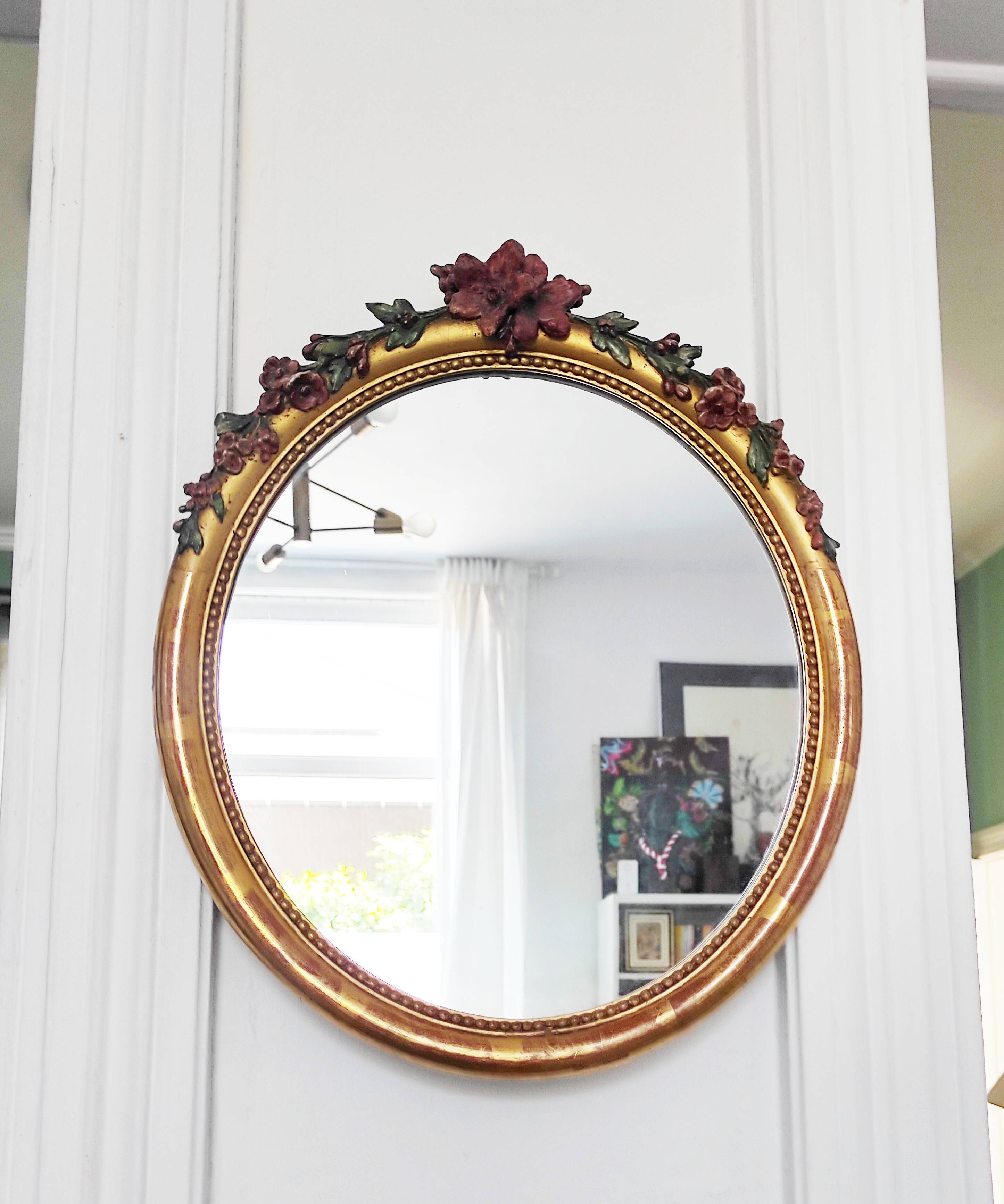 Miroir en bois doré avec fleurs