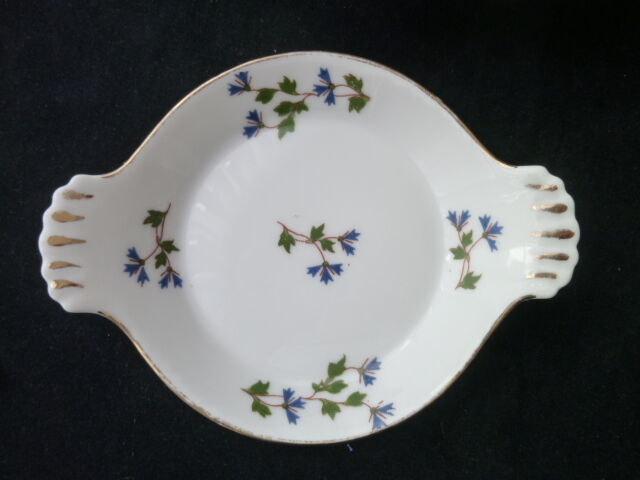 Set of 4 porcelain dishes with fire L. Lourioux de Foecy