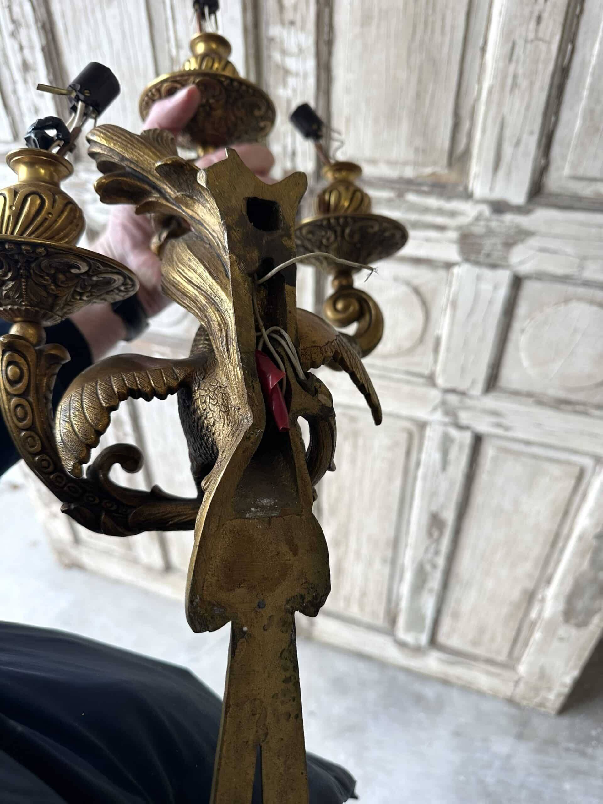Pair of bronze wall sconces with parrots, early 20th century.