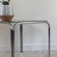 Table basse annees 70 verre et acier chromé
