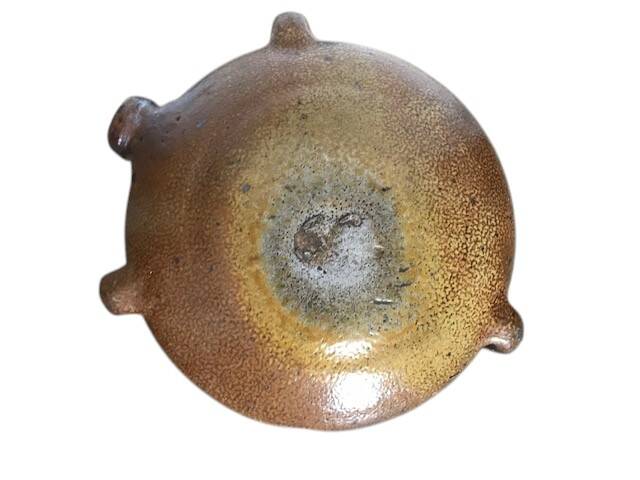 Old stoneware flask known as a toad from the 19th century.