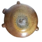 Old stoneware flask known as a toad from the 19th century.