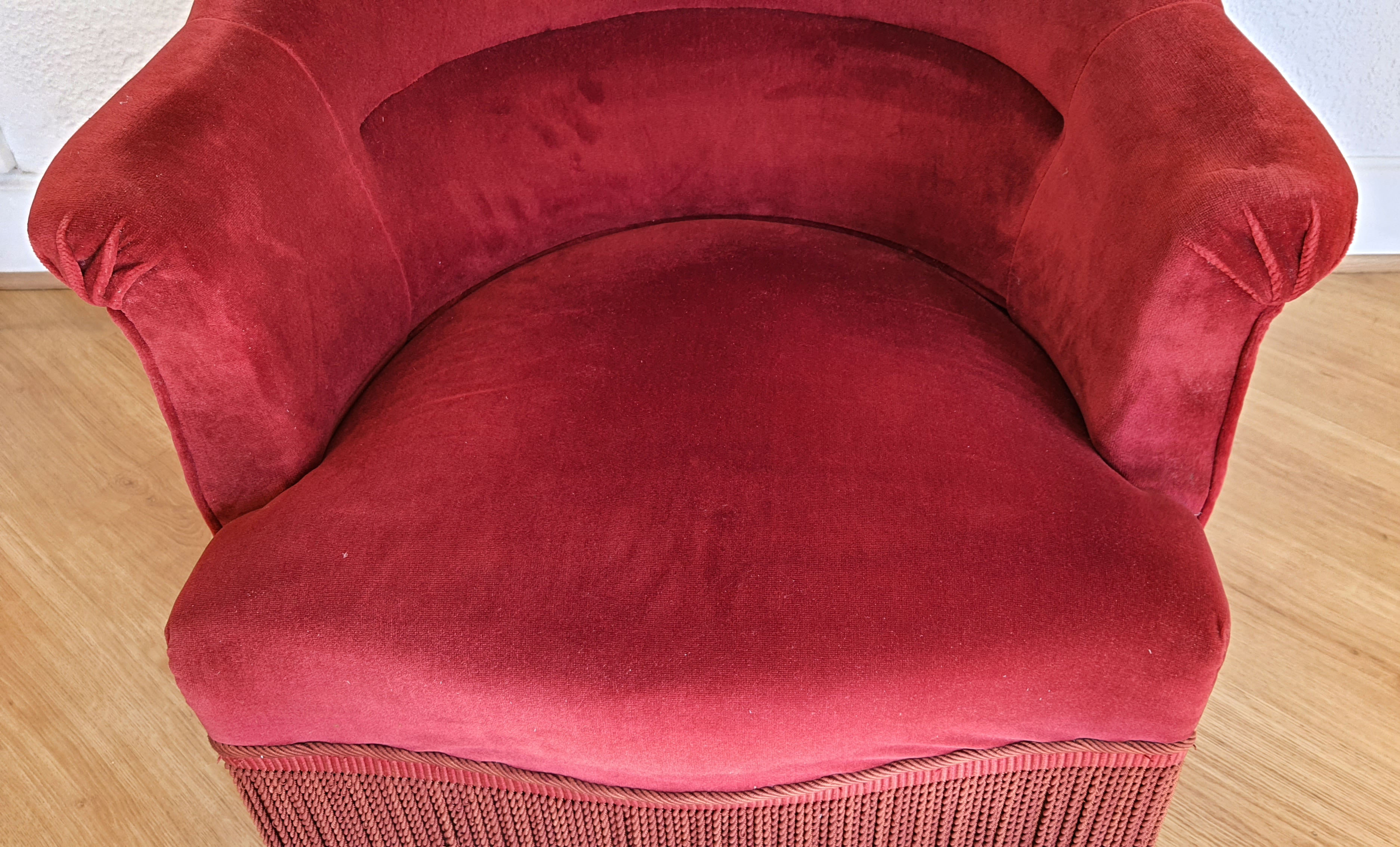 Fauteuil crapaud en velours rouge