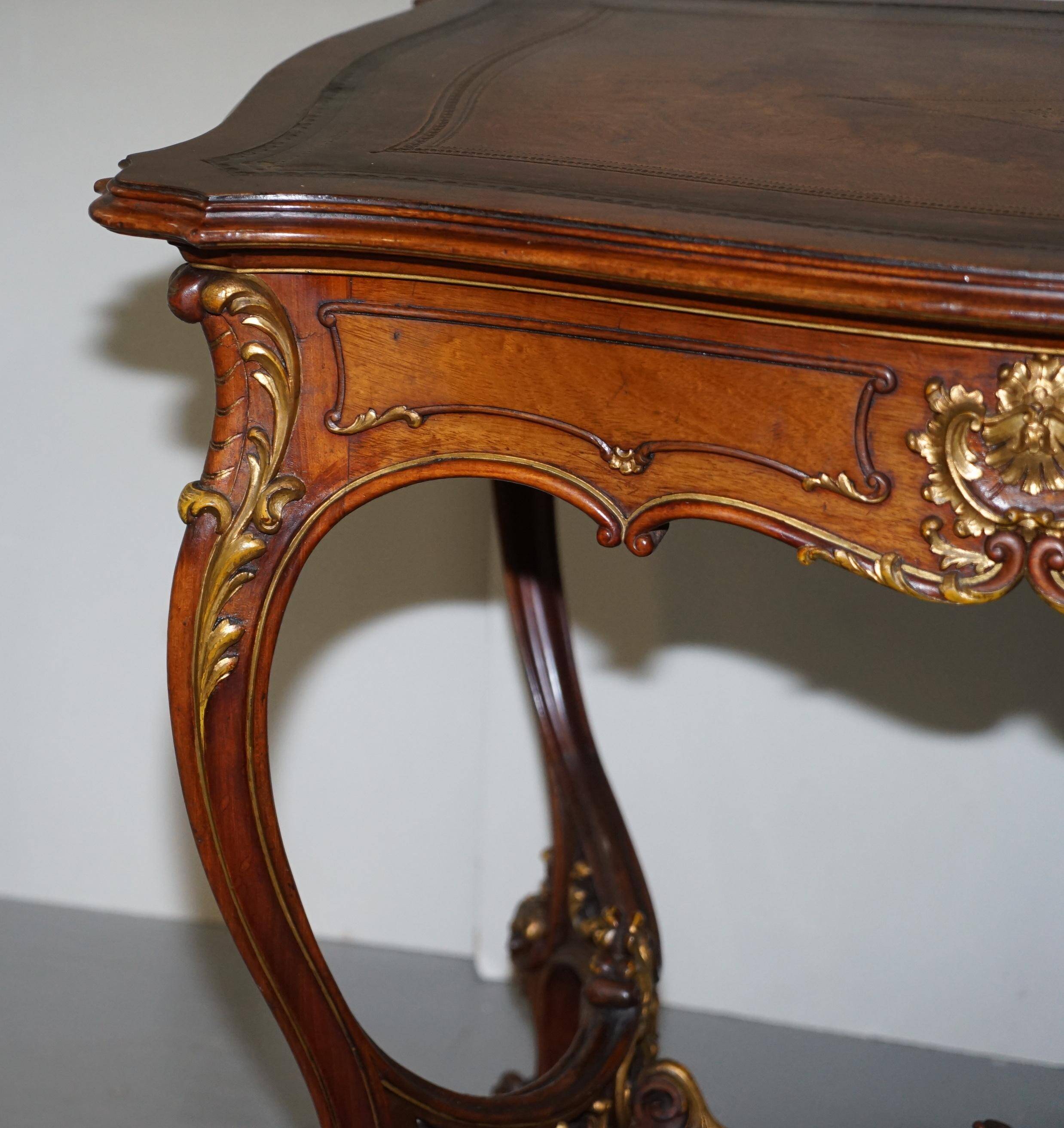 Pine desk with leather and gilding, late Victorian period around 1900.