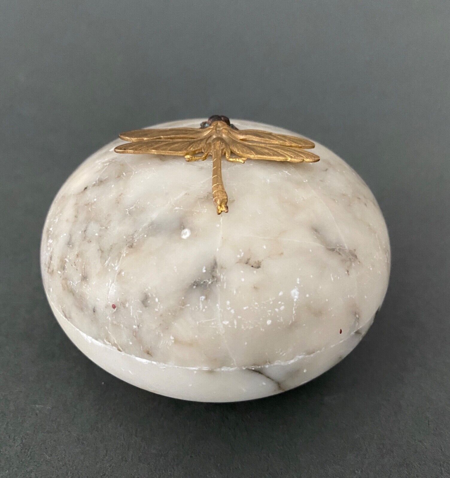 1900 alabaster ball shaped box surmounted by a golden dragonfly