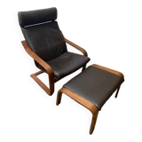 Leather armchair with footrest