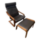Leather armchair with footrest