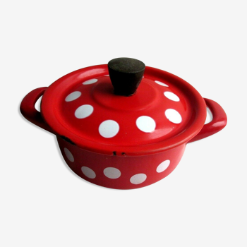 Vintage soup in red enamelled sheet with white polka dots