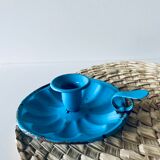 Old enamelled metal candlestick