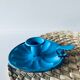 Old enamelled metal candlestick