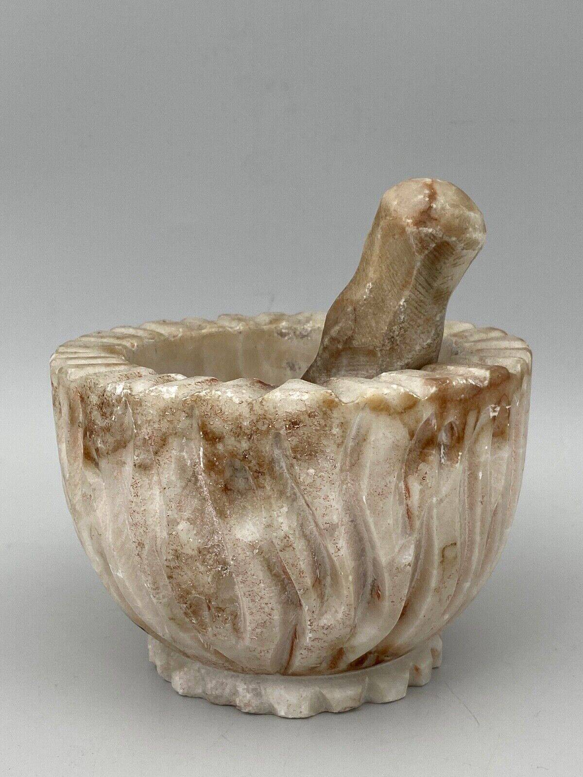 Pharmacy mortar and pestle in alabaster China man's face