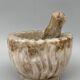 Pharmacy mortar and pestle in alabaster China man's face