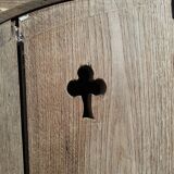 Oak door with clover-shaped oculus