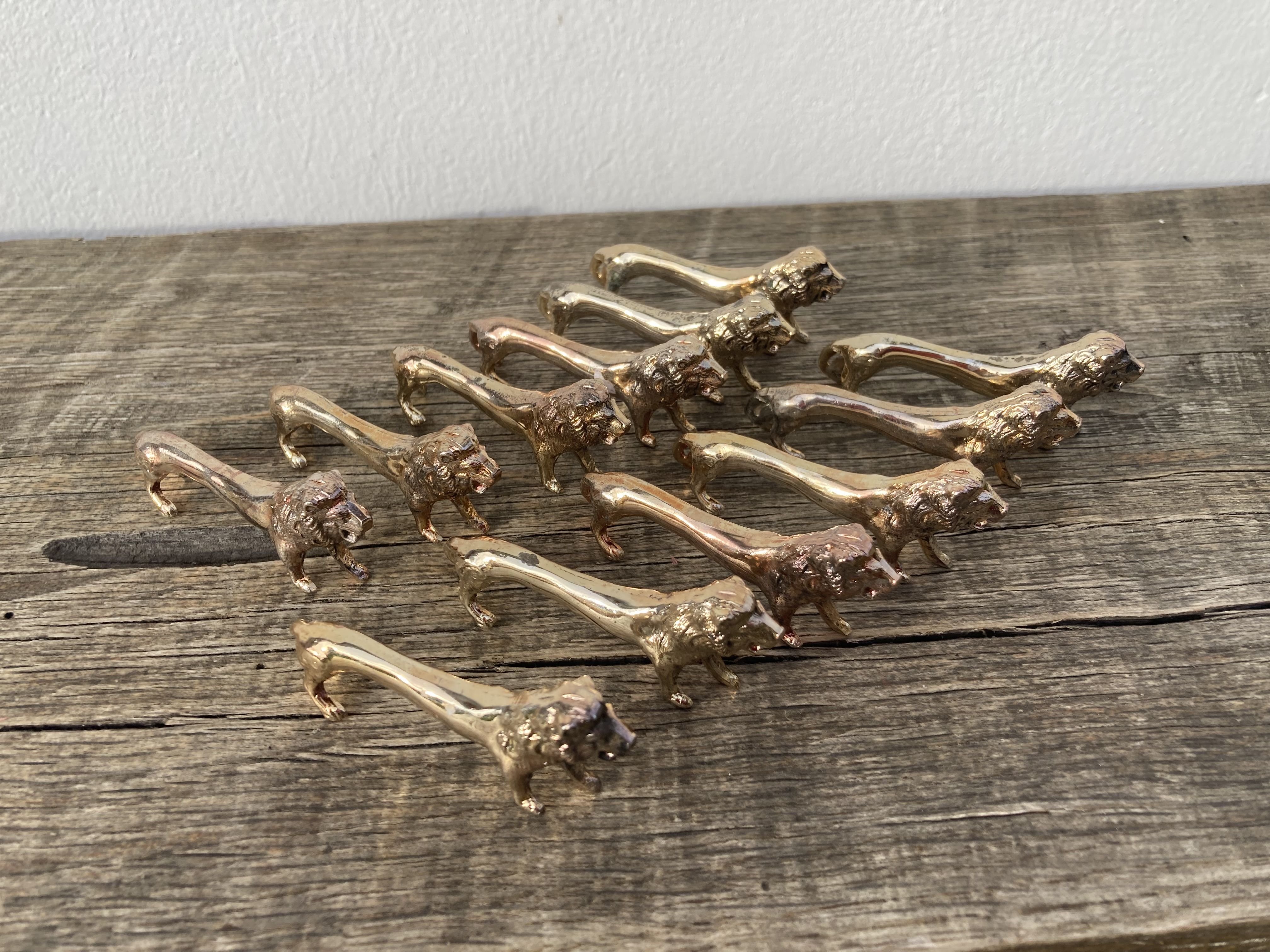 12 vintage gilded gold metal lion animal knife holders