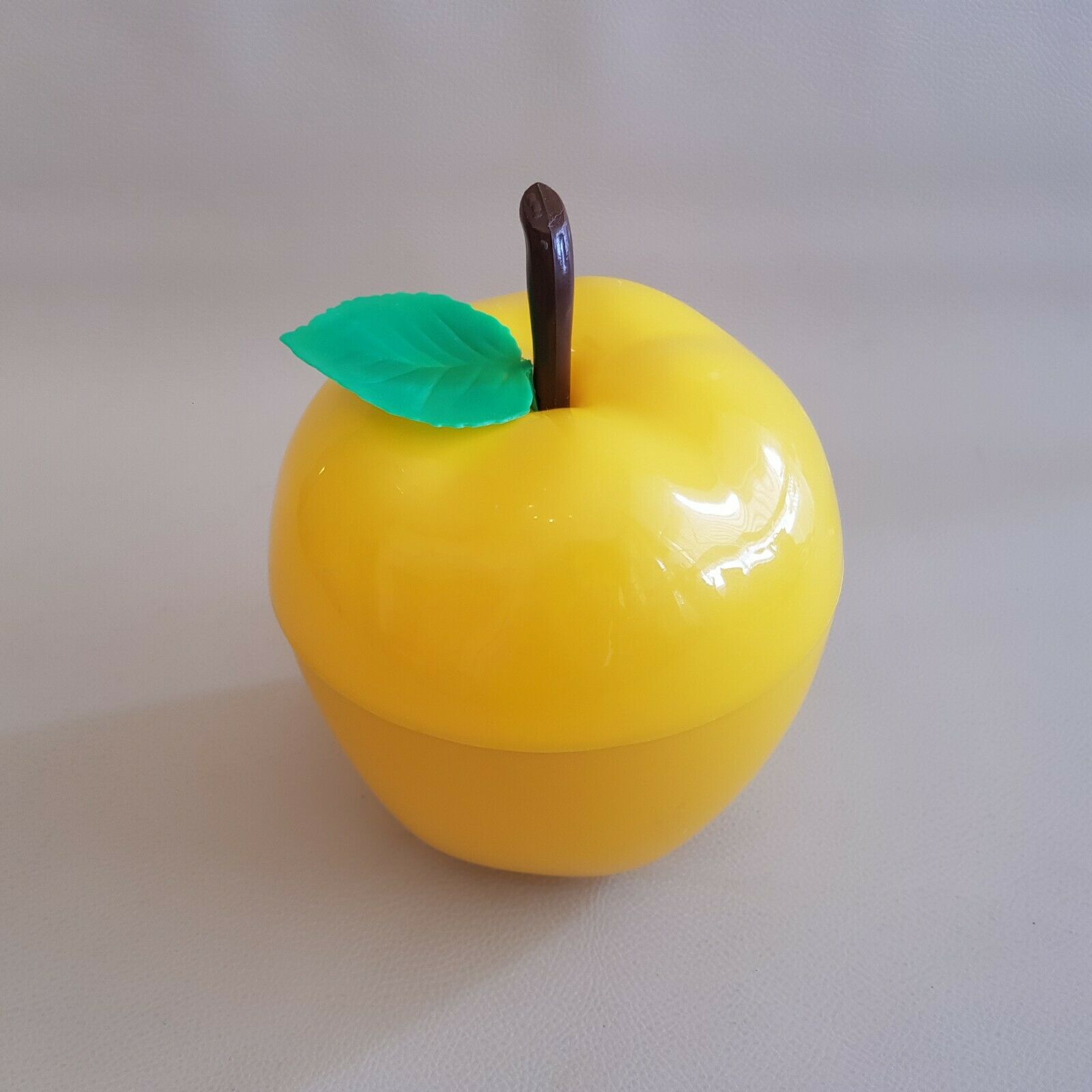 Vintage yellow apple-shaped plastic ice cube tray