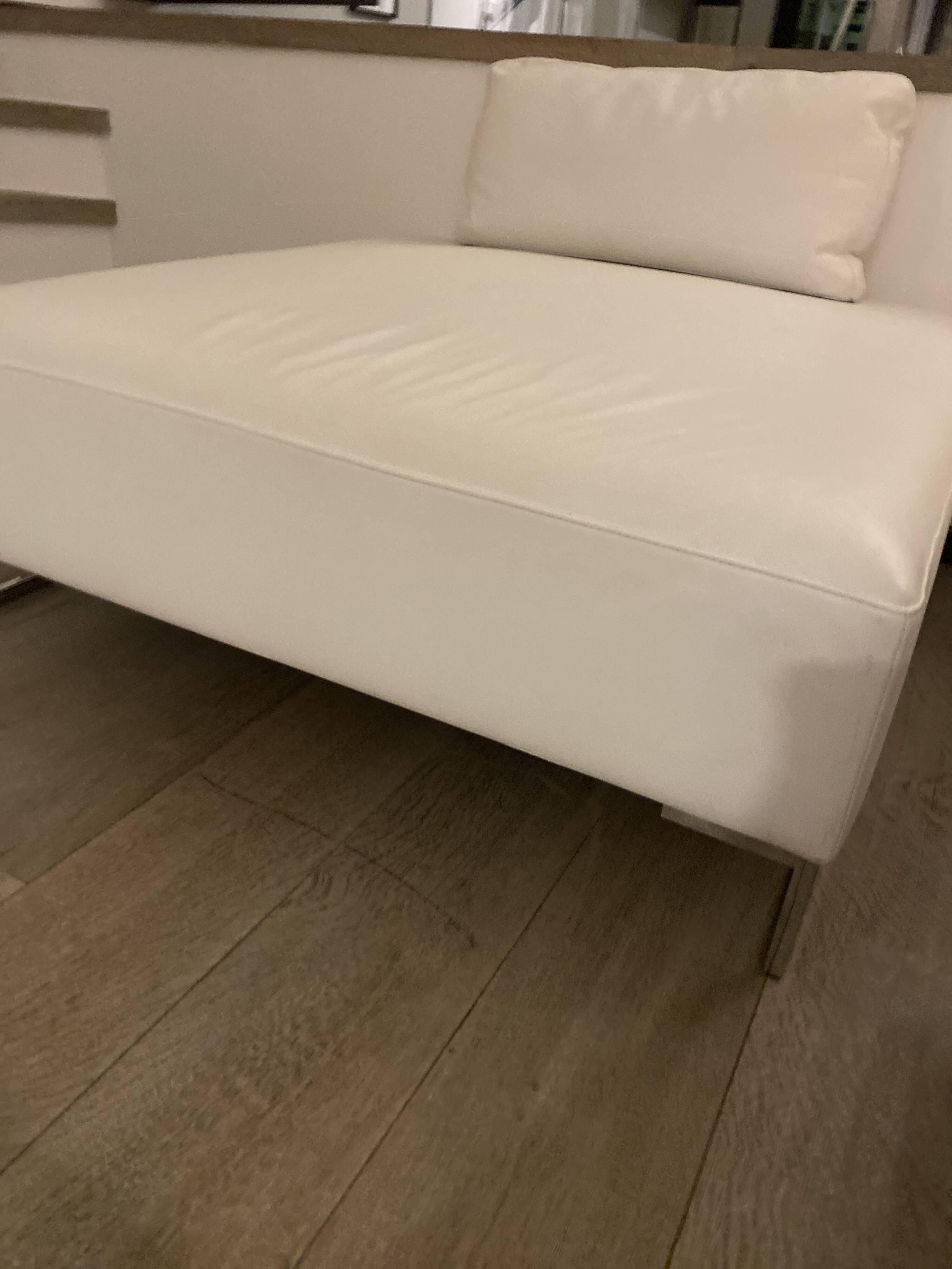 White leather pouf matching Ligne Roset sofa