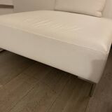 White leather pouf matching Ligne Roset sofa