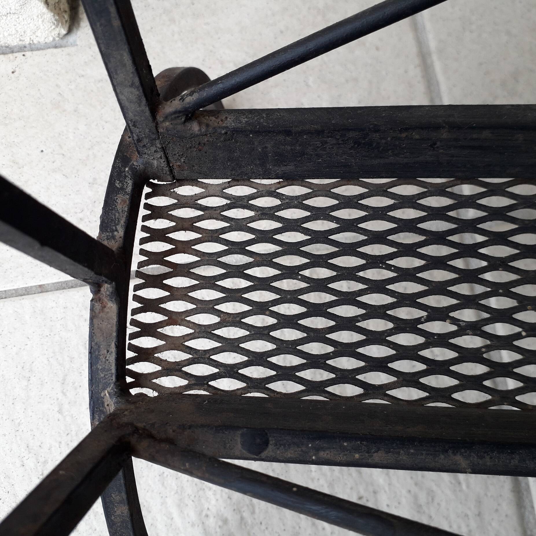 Iron side table with magazine rack