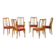 Set of six carved walnut dining chairs, Italy, 1955