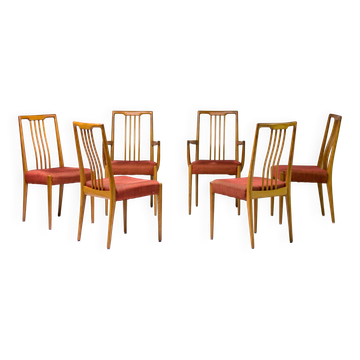 Set of six carved walnut dining chairs, Italy, 1955