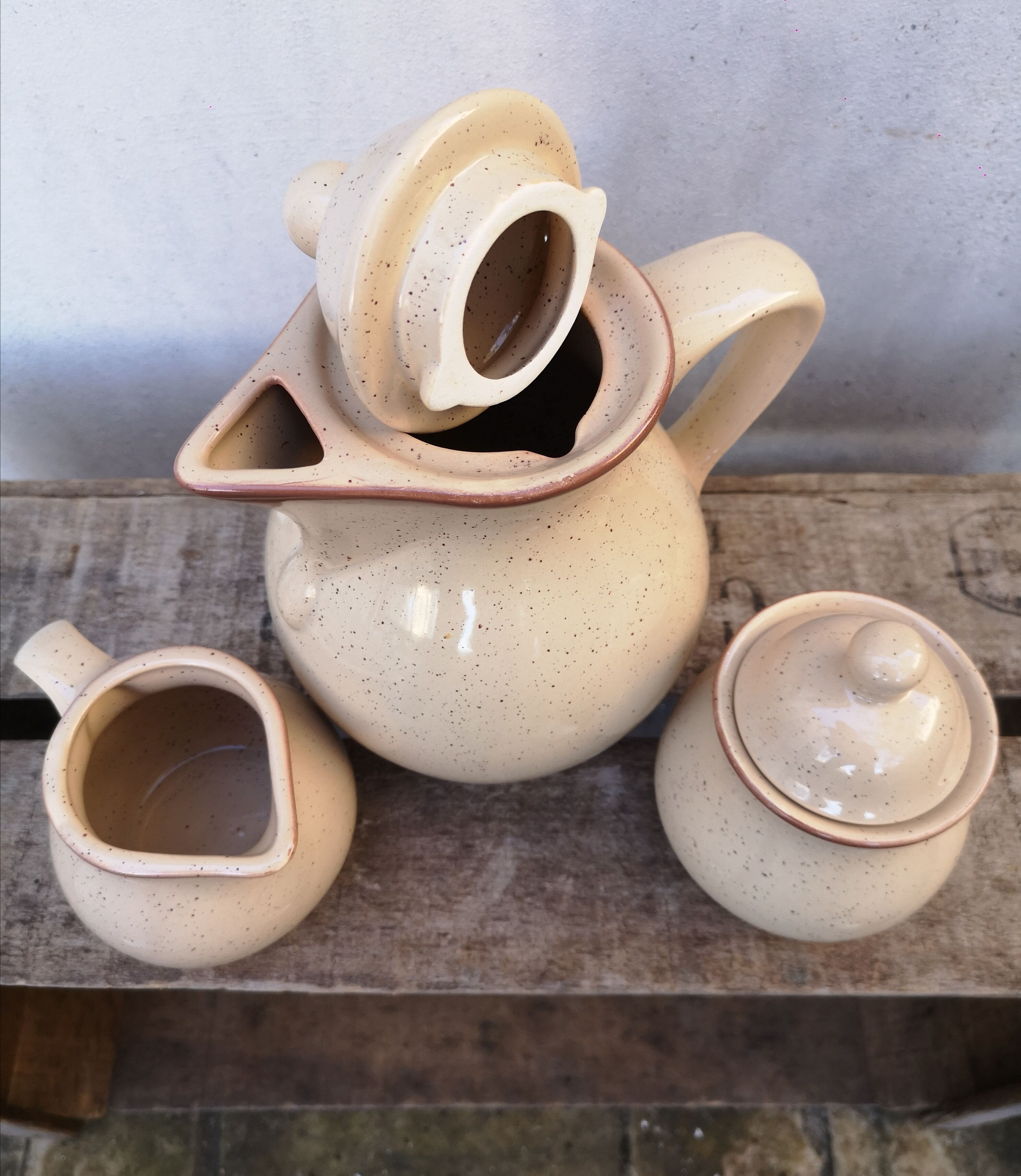 Teapot, milk pot and sugar bowl