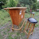 Vintage rattan bar with 1960s earthenware tile decor with 2 stools
