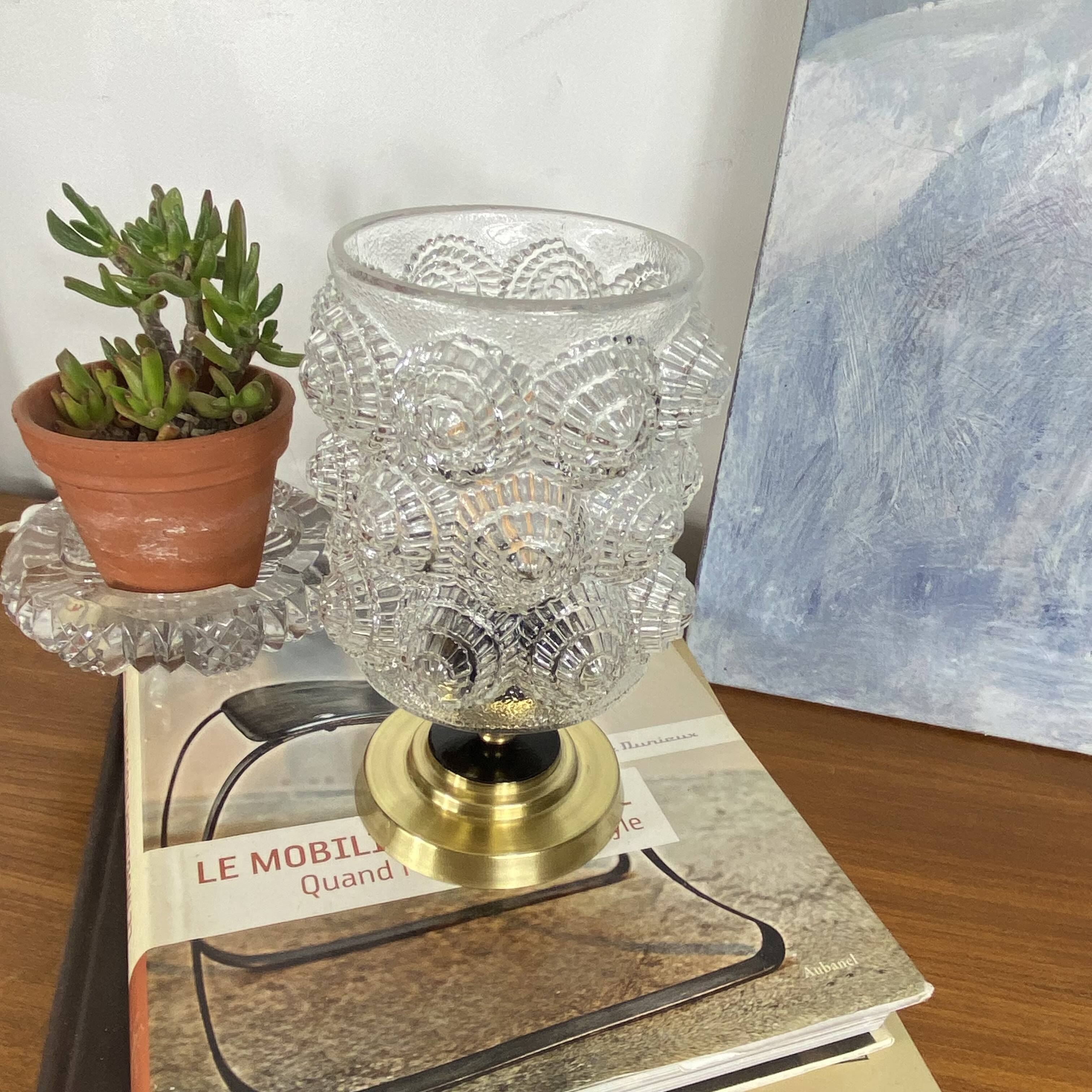 Antique globe table lamp in moulded transparent glass with a brass base.