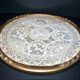 Antique lace top under glass and gilded stucco frame