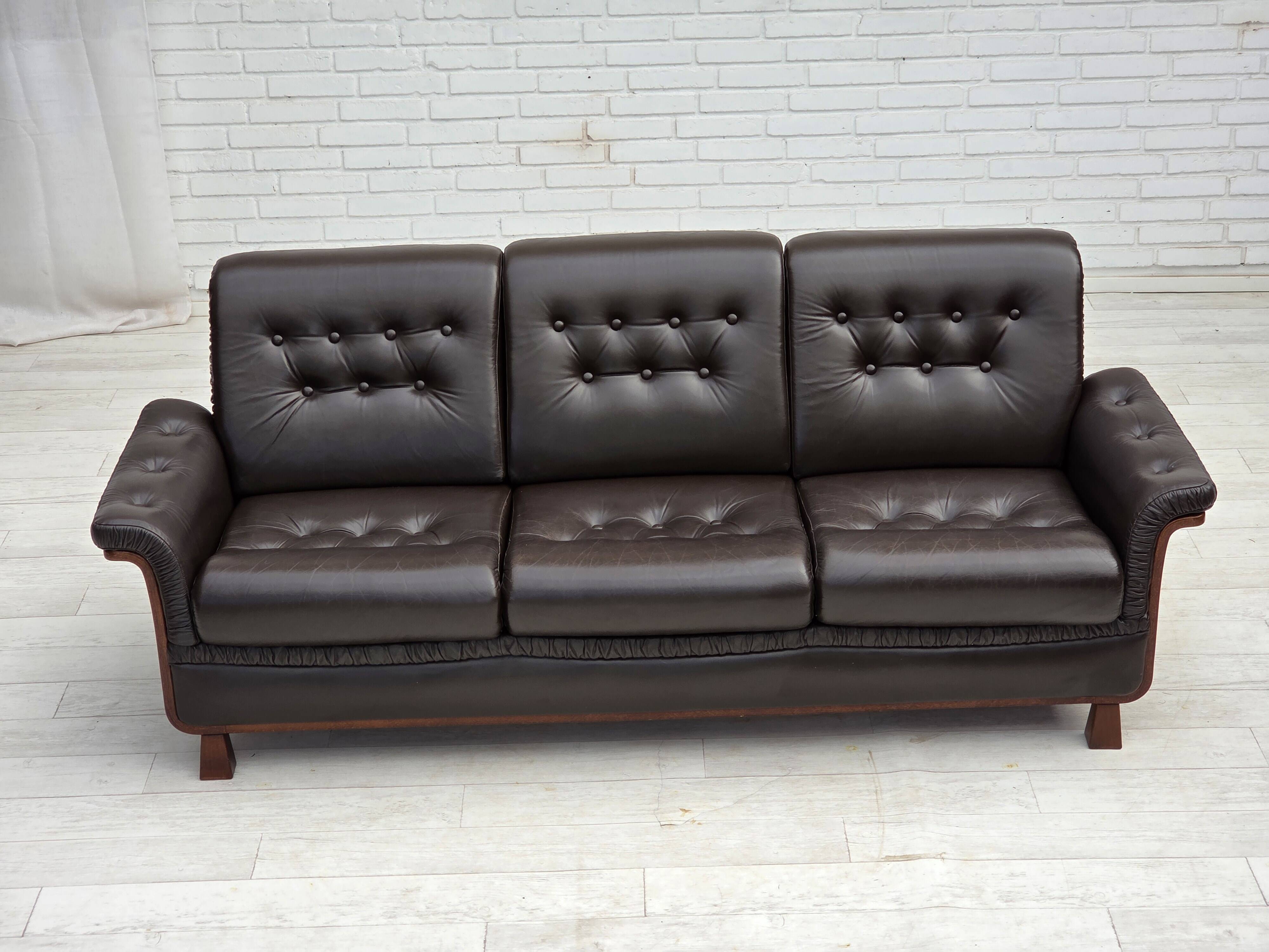 1970s, Scandinavian 3-seater sofa, furniture leather, teak wood legs.