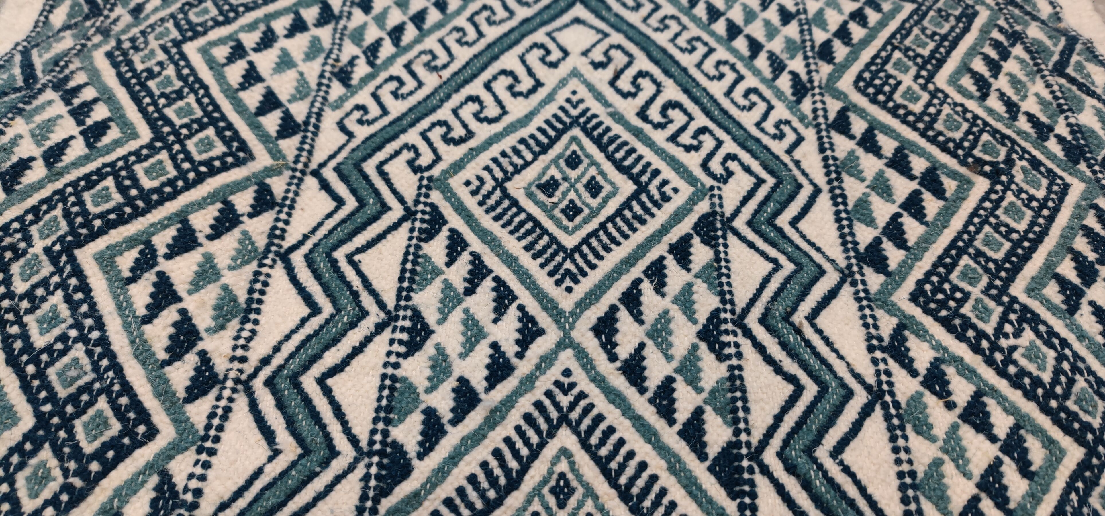 Handmade traditional white and blue carpet, 152x76 cm