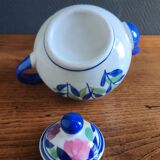 Antique teapot with flower pattern