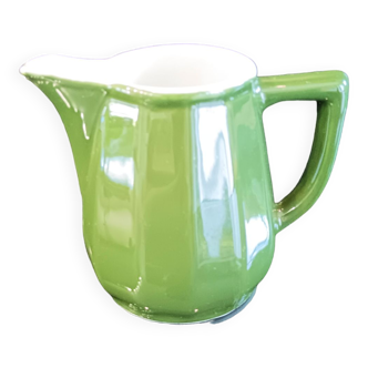 1 Small dark green ceramic milk pitcher. Very good condition. Dimensions: H 11, L 7, W 10 cm.